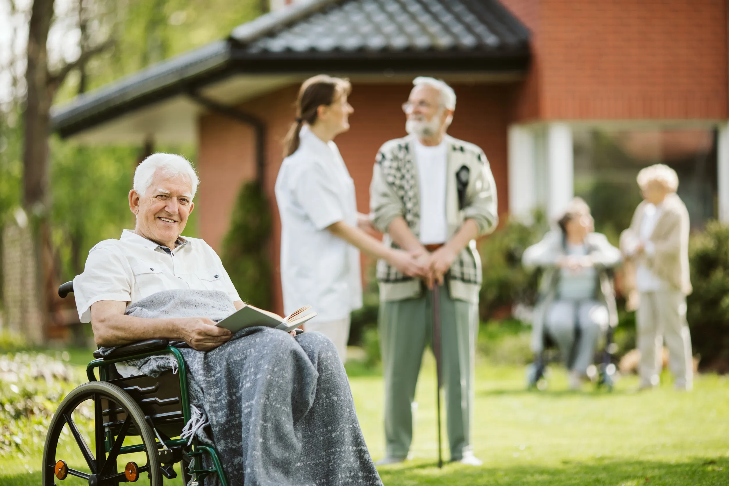 Elderly spending time in the nursing home garden